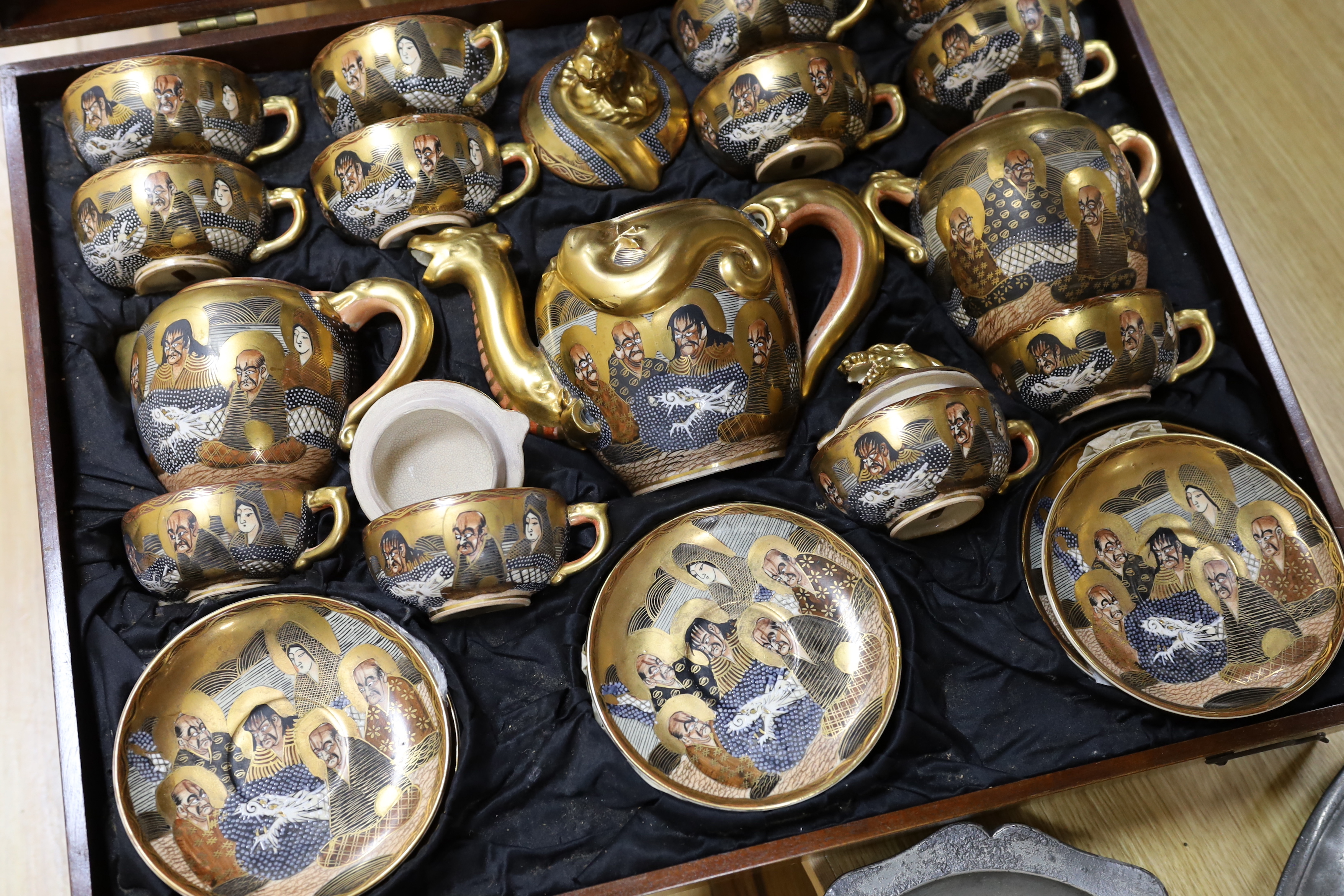 A large mahogany cased set of early 20th century Satsuma teaware